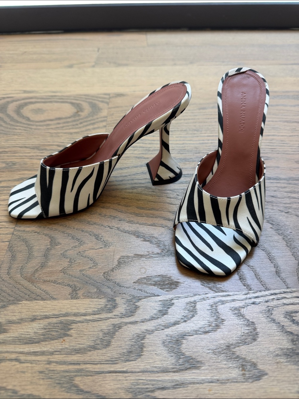 Amina Muaddi Zebra-Print Open-Toe Mules in Black and White